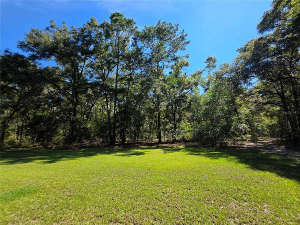 10 Acres of Residential Land with Home for Sale in Newberry, Florida