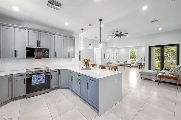 2.73 Acres of Residential Land with Home for Sale in Naples, Florida