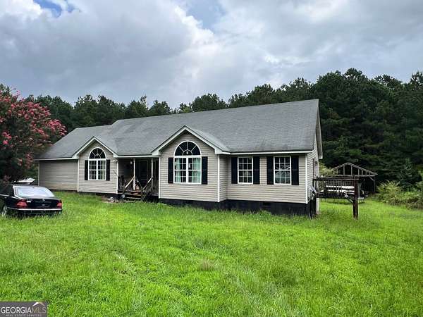 19.9 Acres of Land with Home for Sale in Winder, Georgia
