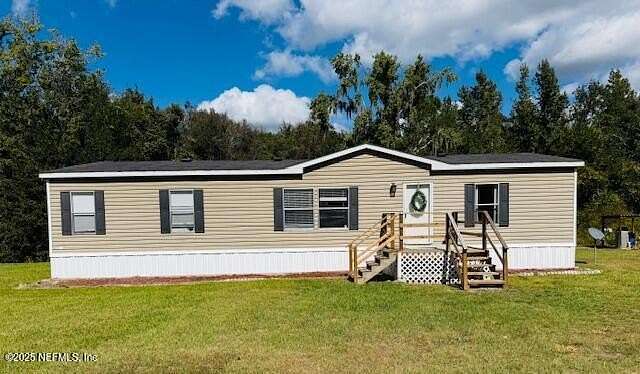 5 Acres of Residential Land with Home for Sale in Sanderson, Florida