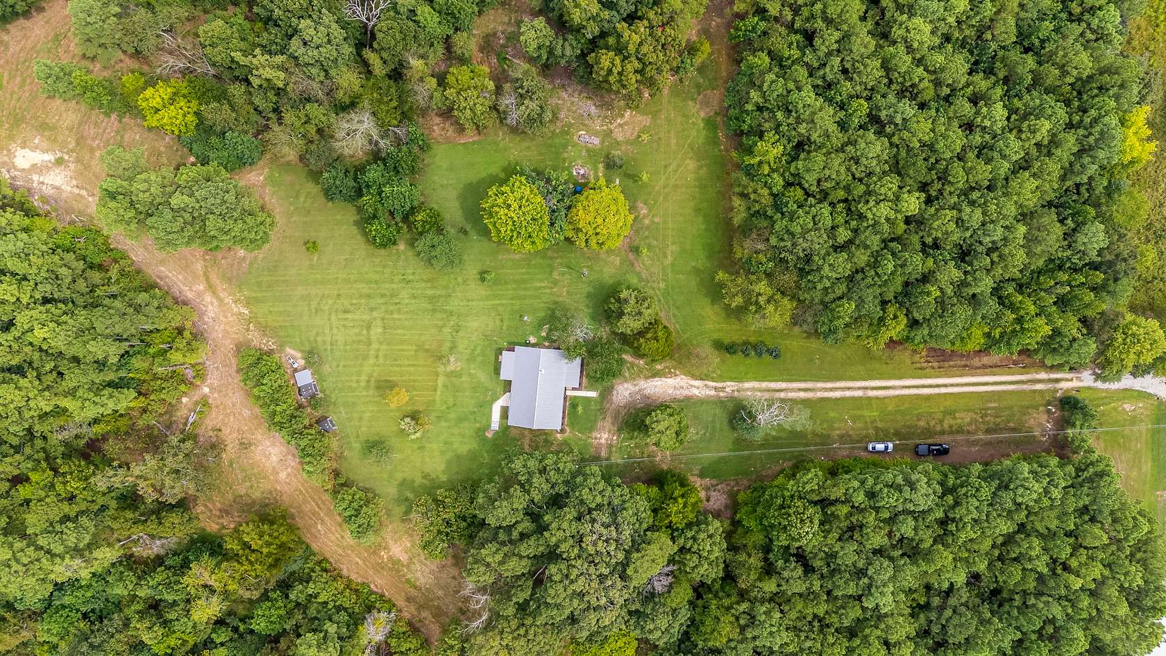 49.5 Acres of Recreational Land with Home for Sale in Hohenwald, Tennessee