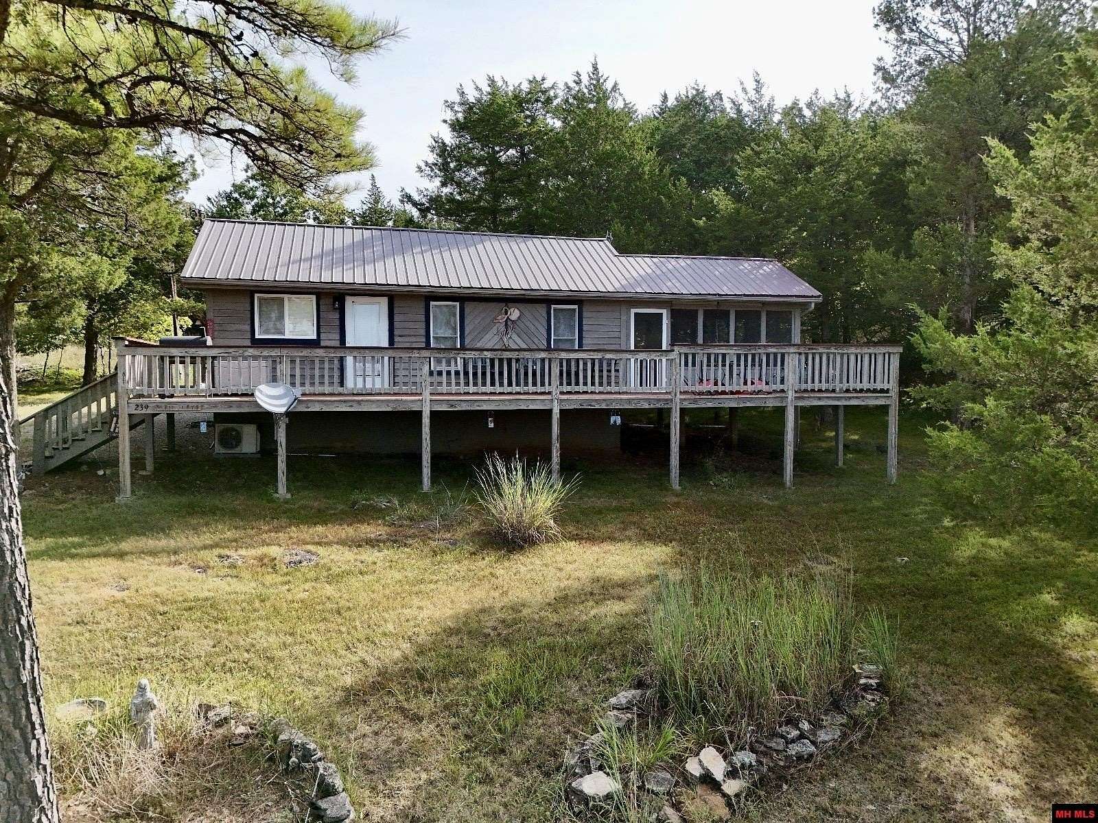 1.55 Acres of Land with Home for Sale in Oakland, Arkansas