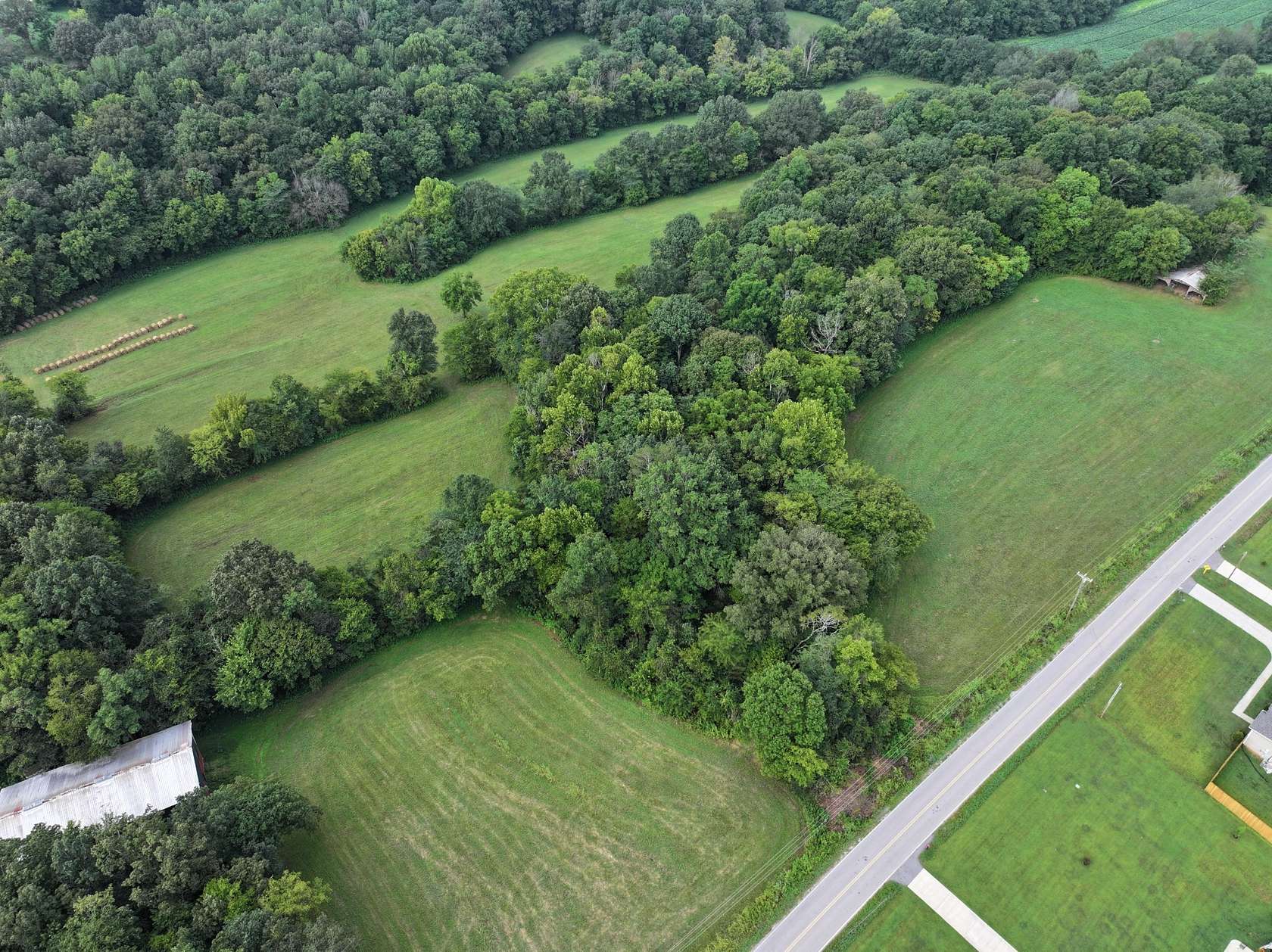 5 Acres of Land with Home for Sale in Woodlawn, Tennessee
