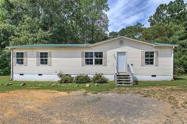 3.36 Acres of Residential Land with Home for Sale in Summerville, Georgia