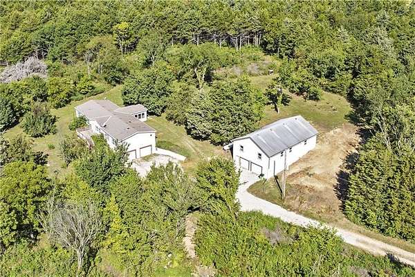 60 Acres of Agricultural Land with Home for Sale in Greeley, Kansas