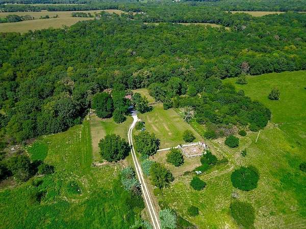 11 Acres of Land with Home for Sale in Cleveland, Missouri