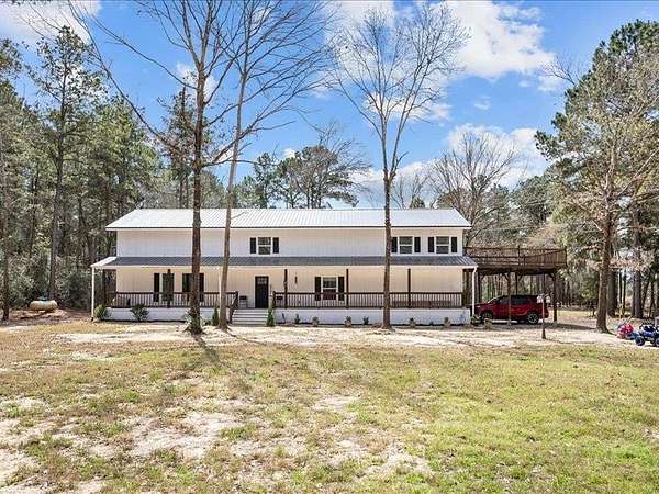 20.9 Acres of Recreational Land with Home for Sale in Grapeland, Texas