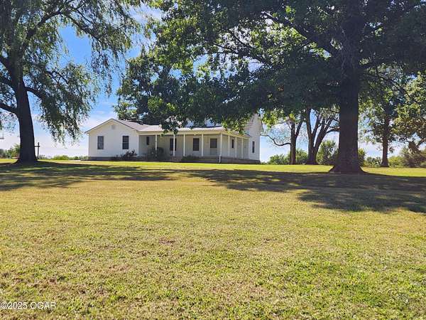 3 Acres of Residential Land with Home for Sale in Lamar, Missouri