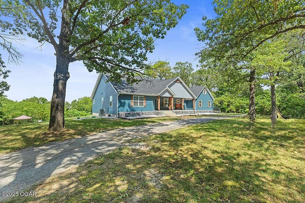 4 Acres of Residential Land with Home for Sale in Carl Junction, Missouri