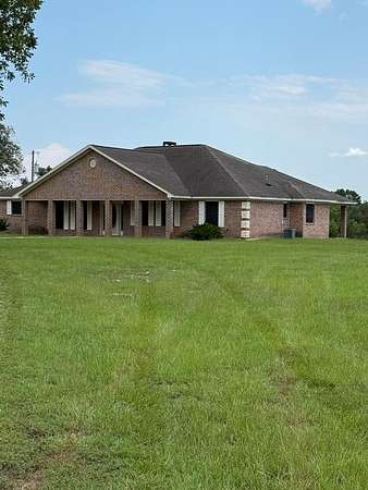 47 Acres of Agricultural Land with Home for Sale in Timpson, Texas