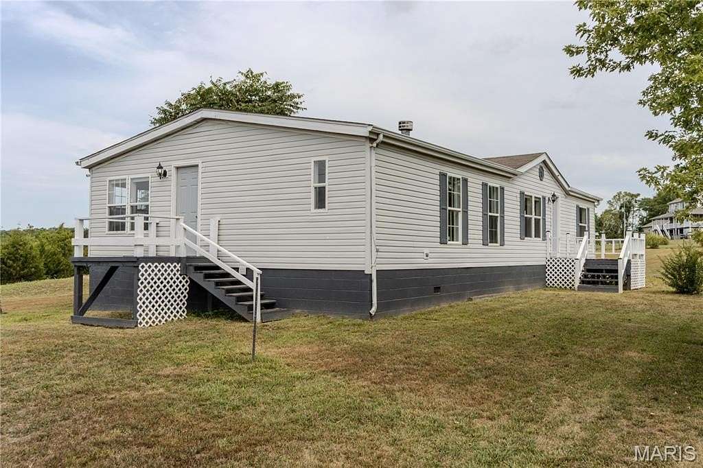 4.13 Acres of Residential Land with Home for Sale in Richland, Missouri