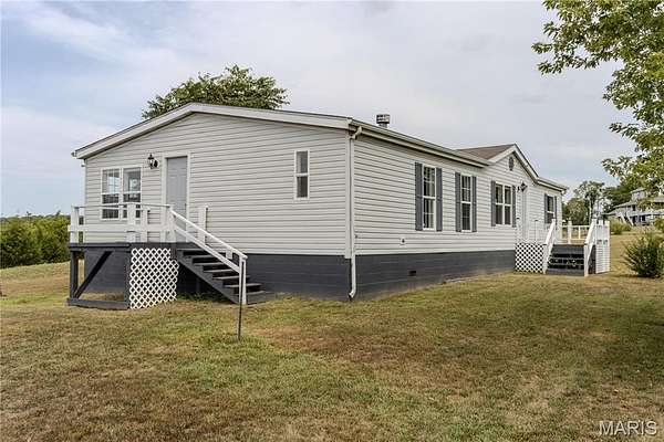 4.13 Acres of Residential Land with Home for Sale in Richland, Missouri