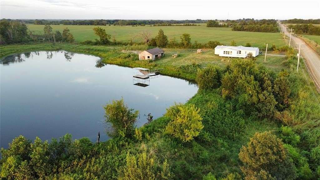 24 Acres of Land with Home for Sale in Okemah, Oklahoma