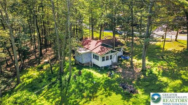 24 Acres of Agricultural Land with Home for Sale in Greentown, Pennsylvania