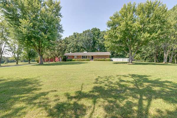 17.6 Acres of Land with Home for Sale in Charlotte, Tennessee
