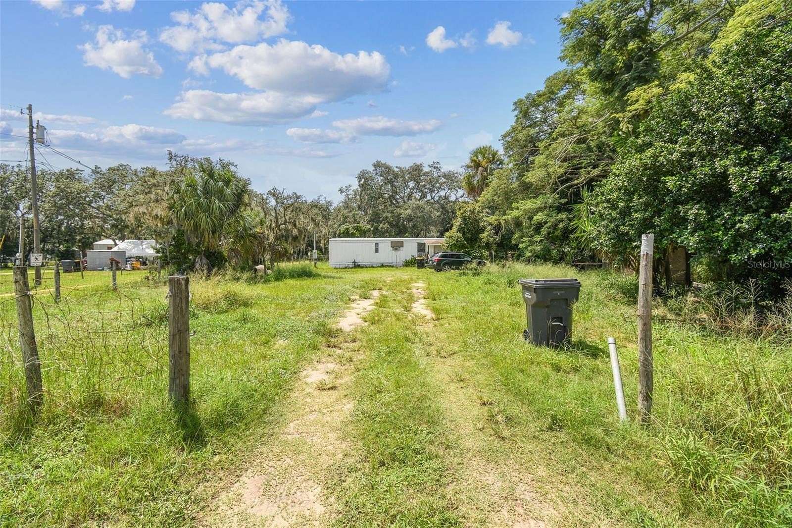 1.53 Acres of Residential Land with Home for Sale in Davenport, Florida