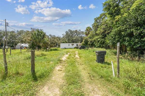 1.53 Acres of Residential Land with Home for Sale in Davenport, Florida