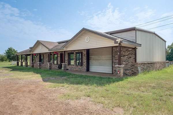 5 Acres of Residential Land with Home for Sale in Grapeland, Texas