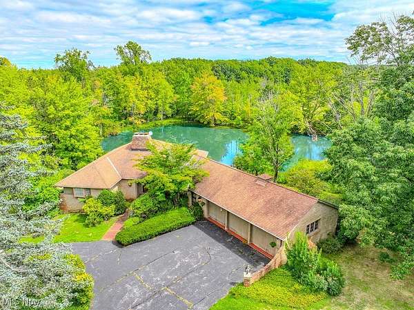 12.3 Acres of Recreational Land with Home for Sale in Concord, Ohio