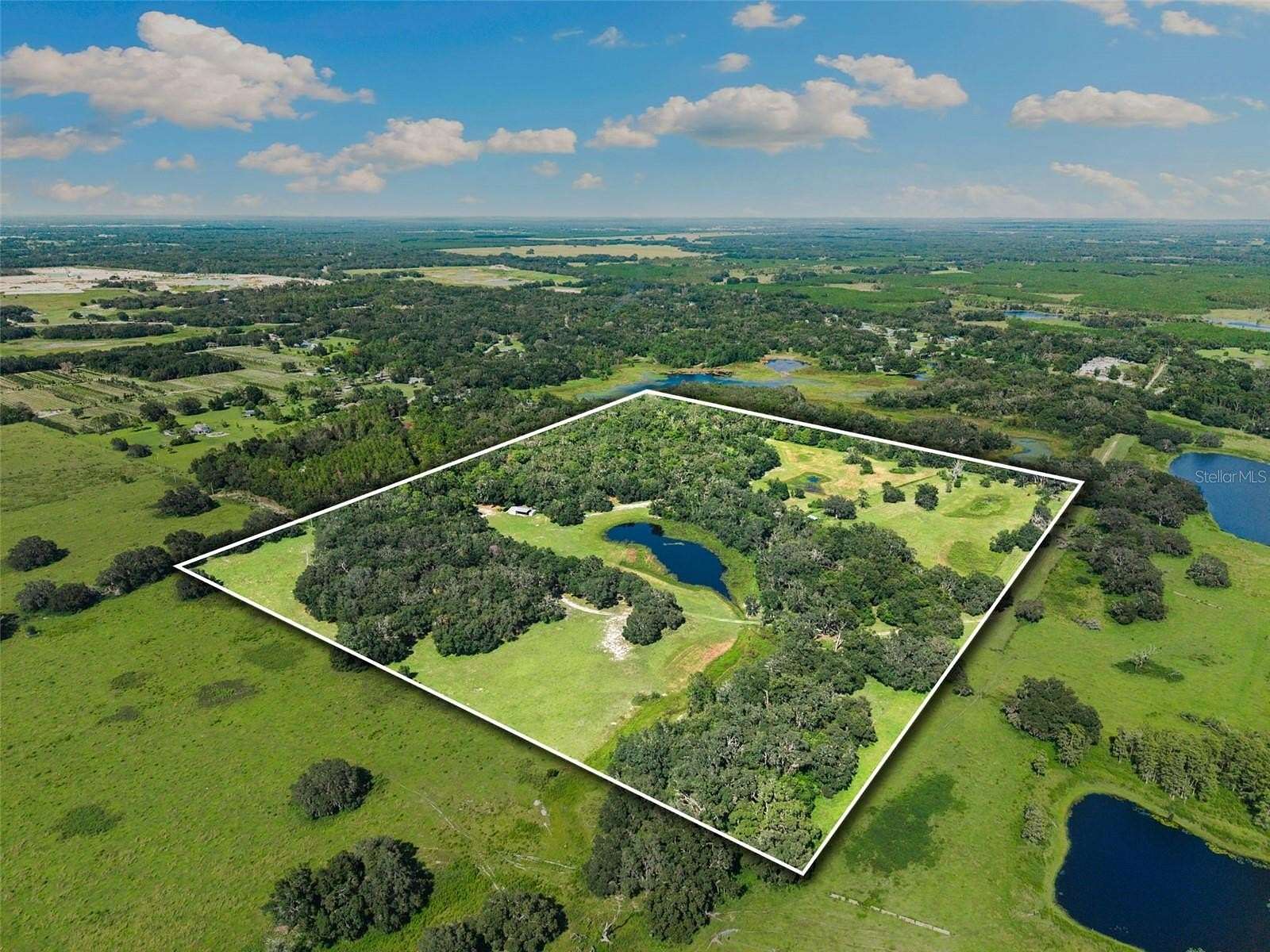 50.6 Acres of Agricultural Land with Home for Sale in Spring Hill, Florida