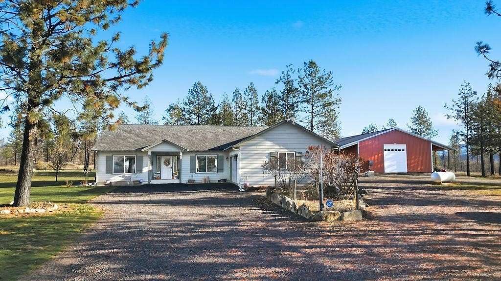 19.9 Acres of Land with Home for Sale in Elk, Washington