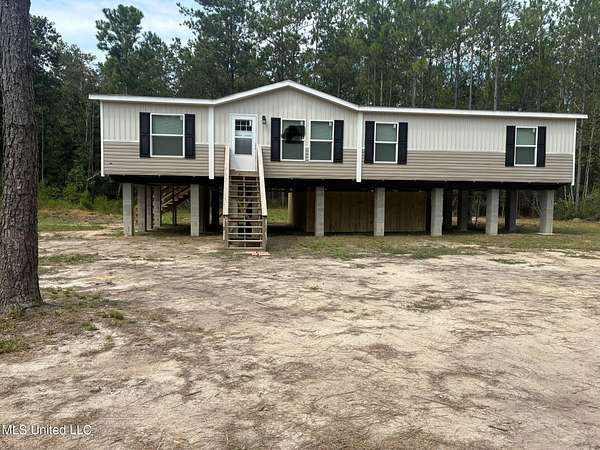 3.3 Acres of Residential Land with Home for Sale in Saucier, Mississippi