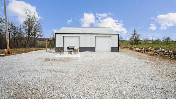 10 Acres of Residential Land with Home for Sale in Walnut Grove, Missouri