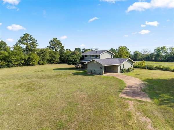 11.1 Acres of Land with Home for Sale in Pittsburg, Texas