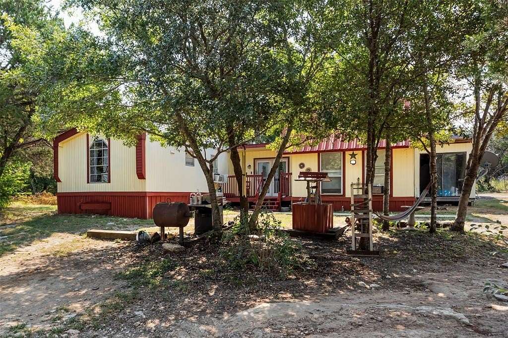 3.1 Acres of Residential Land with Home for Sale in Granbury, Texas