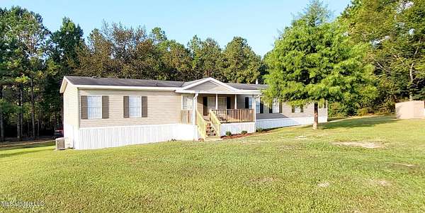 3.7 Acres of Residential Land with Home for Sale in Saucier, Mississippi