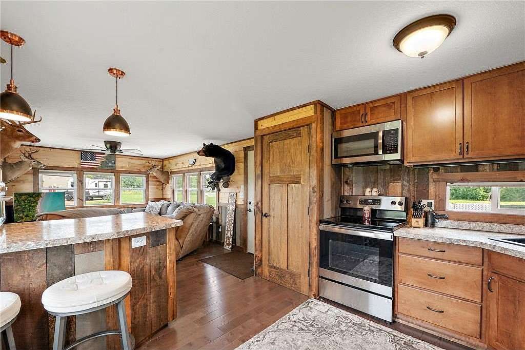 76.7 Acres of Recreational Land with Home for Sale in Moose Lake, Minnesota