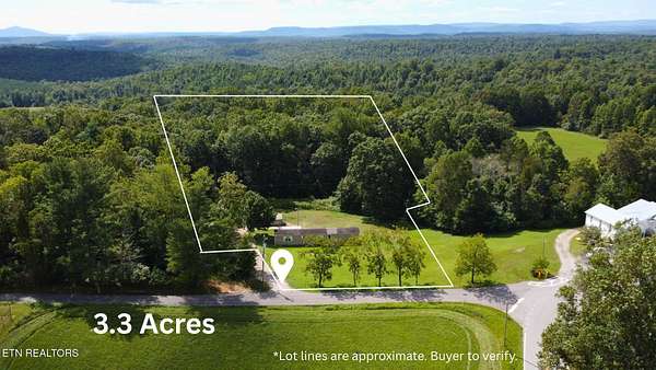 3.3 Acres of Residential Land with Home for Sale in Lancing, Tennessee