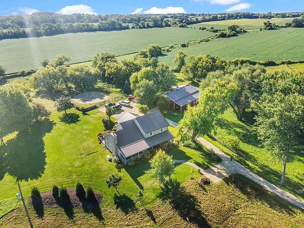 64 Acres of Land with Home for Sale in Harvard, Illinois