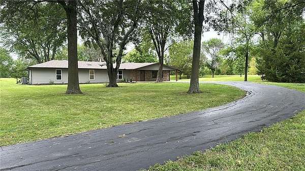 9.7 Acres of Residential Land with Home for Sale in Paola, Kansas