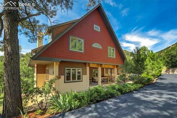 2.2 Acres of Residential Land with Home for Sale in Palmer Lake, Colorado