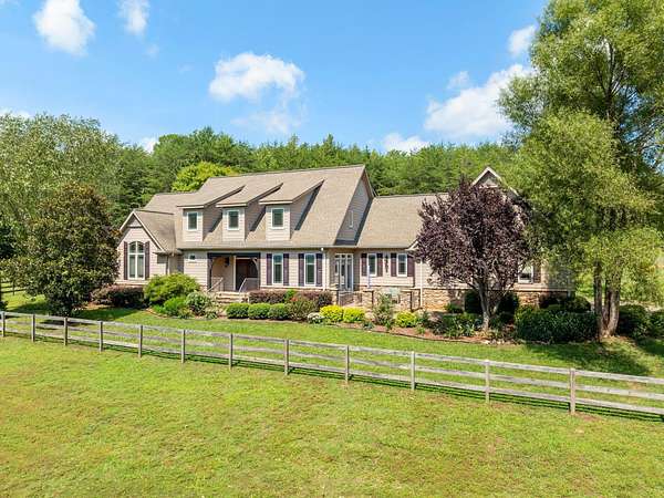 5.4 Acres of Residential Land with Home for Sale in Landrum, South Carolina