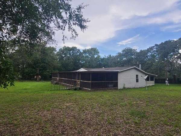 5.5 Acres of Land with Home for Sale in Brooksville, Florida