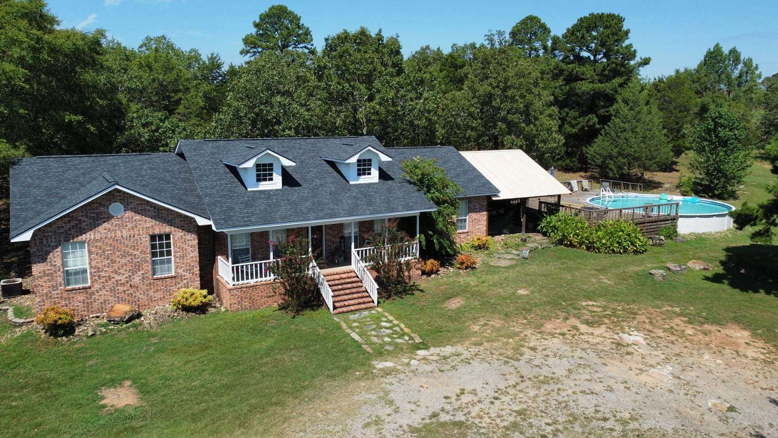 8 Acres of Land with Home for Sale in Ozark, Arkansas
