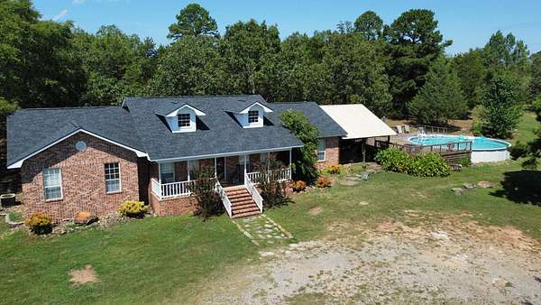 8 Acres of Residential Land with Home for Sale in Ozark, Arkansas