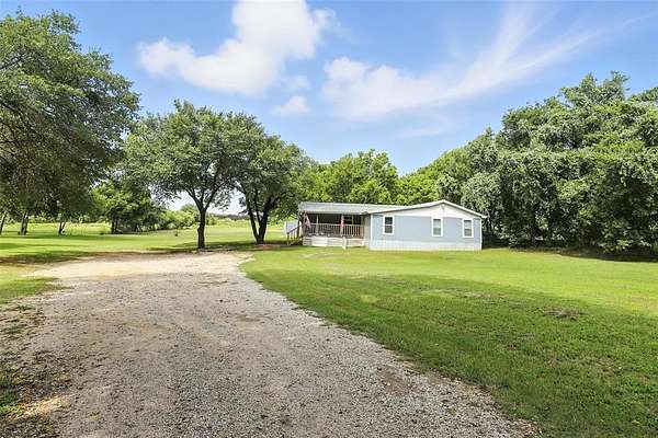 4.48 Acres of Residential Land with Home for Sale in Burleson, Texas