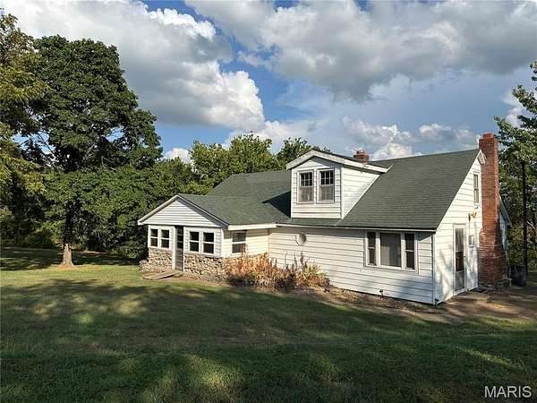 58.2 Acres of Land with Home for Sale in Belle, Missouri