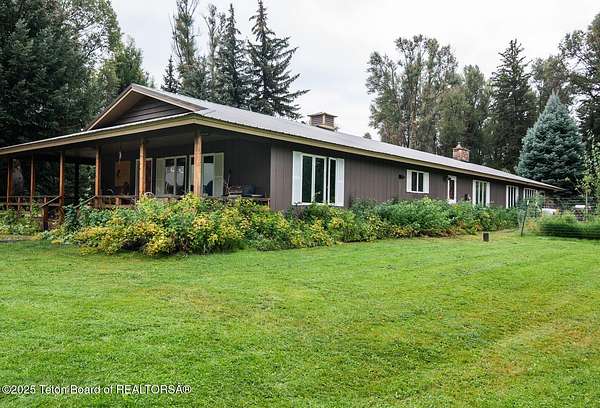 4 Acres of Residential Land with Home for Sale in Wilson, Wyoming