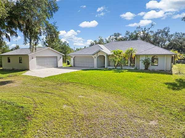 3 Acres of Residential Land with Home for Sale in North Port, Florida