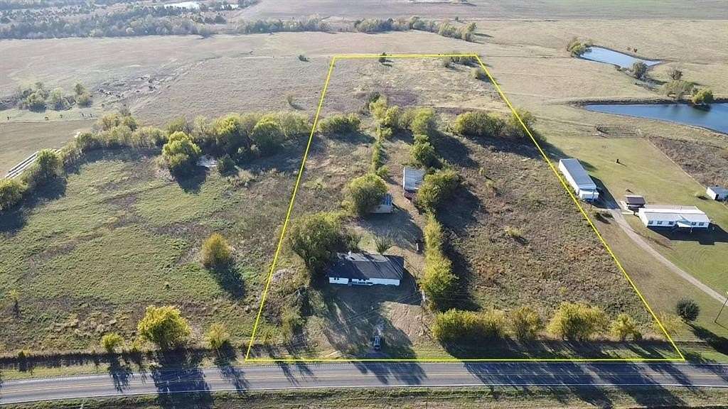 9.13 Acres of Land with Home for Sale in Honey Grove, Texas
