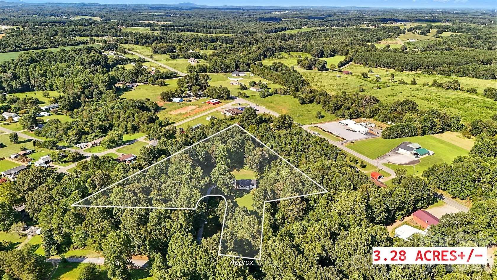 3.28 Acres of Land with Home for Sale in Lawndale, North Carolina