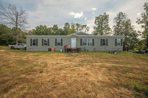 7.3 Acres of Residential Land with Home for Sale in Washburn, Missouri