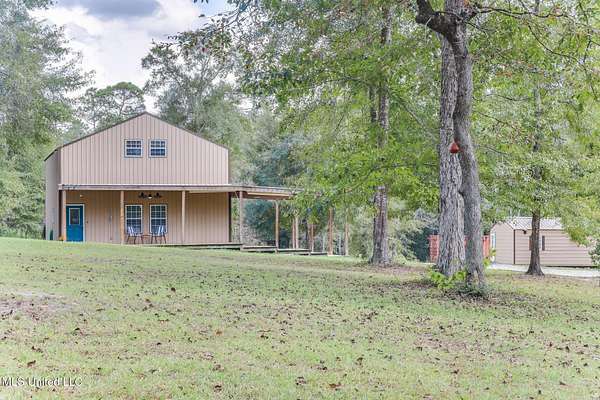 12.1 Acres of Land with Home for Sale in Wiggins, Mississippi