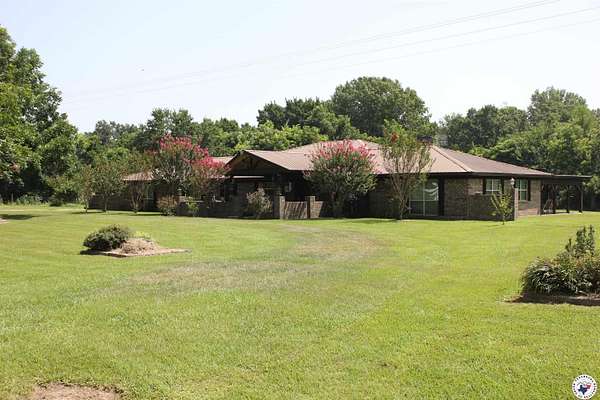 6 Acres of Residential Land with Home for Sale in Hooks, Texas