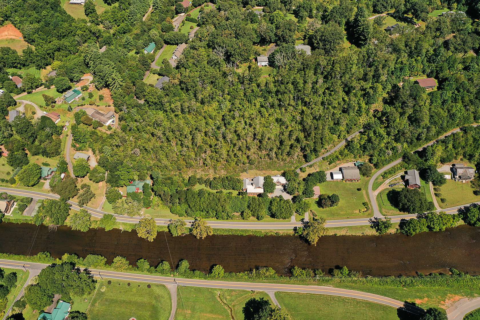 6.3 Acres of Land with Home for Sale in Sylva, North Carolina