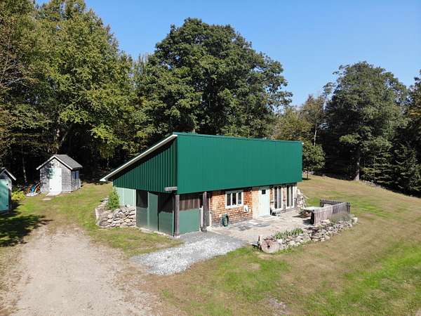 5.73 Acres of Land with Home for Sale in Brooks, Maine